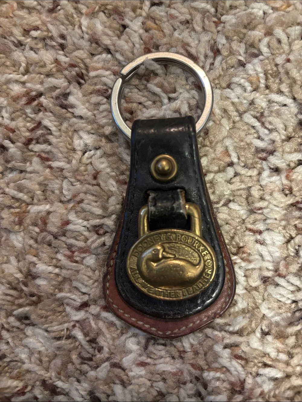 Dooney & Bourke Black and Brown Leather Key Fob with Brass Duck Emblem